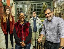 (from left) sophomore Sophia DuRose, Professor Simone White, graduate student Davis Knittle, and Writers House Director Al Filreis in front of the Kelly Writers House.