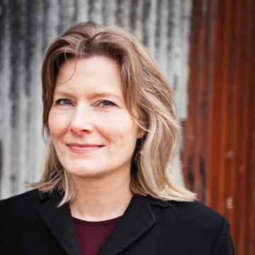 Jennifer Egan in black coat