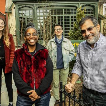 (from left) sophomore Sophia DuRose, Professor Simone White, graduate student Davis Knittle, and Writers House Director Al Filreis in front of the Kelly Writers House.